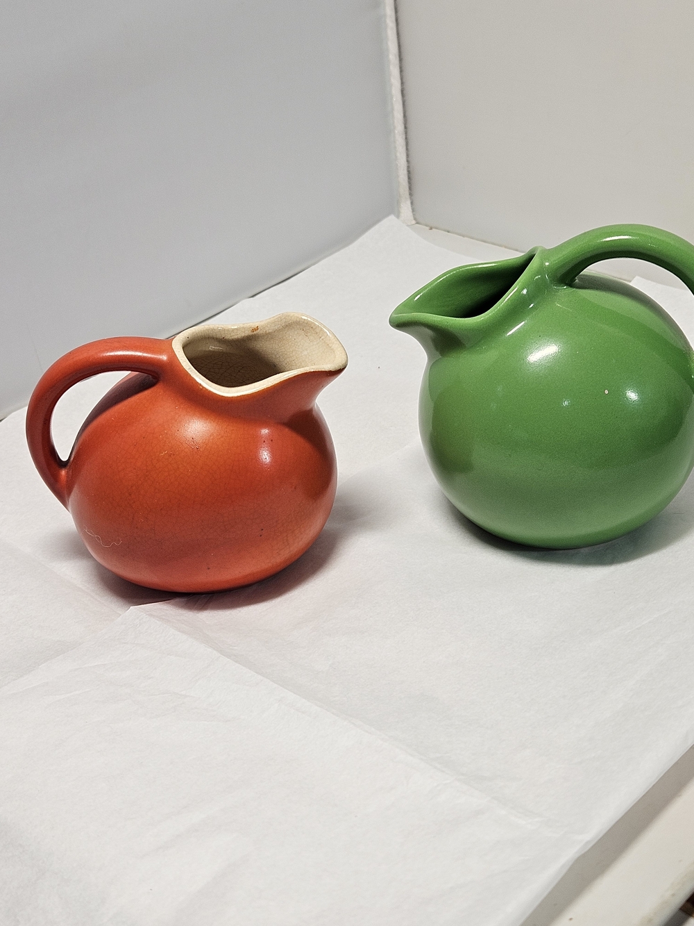 Two Vintage Small Tilt Ball Creamers